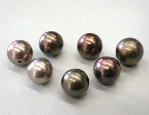 Perle di coltura “cioccolato”, a colorazione modificata